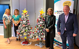Image of The joy of folding and giving to others at Christmas time.