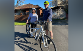Image of Annette is loving the freedom of riding thanks to Andrew, her tandem bike pilot.