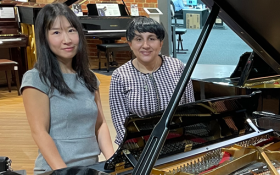 image of Creating music with her piano buddy, Jermin, has become very special to Hitomi.