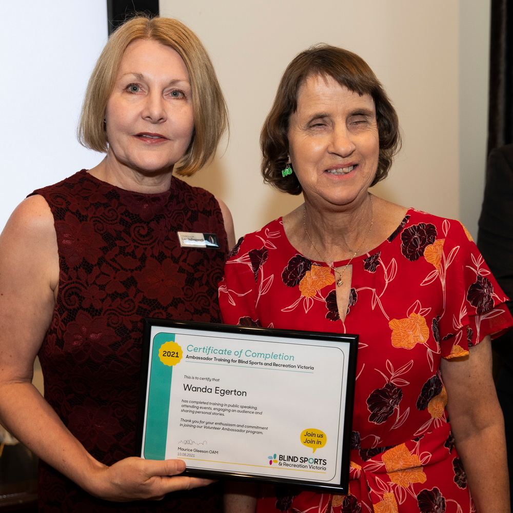 Wanda receiving Ambassador Certificate